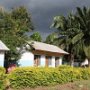 From left: the new Chicken Room, the First-Aid-Station with the dormitory of the boys, the playground and with the blue roof the new Social Room.